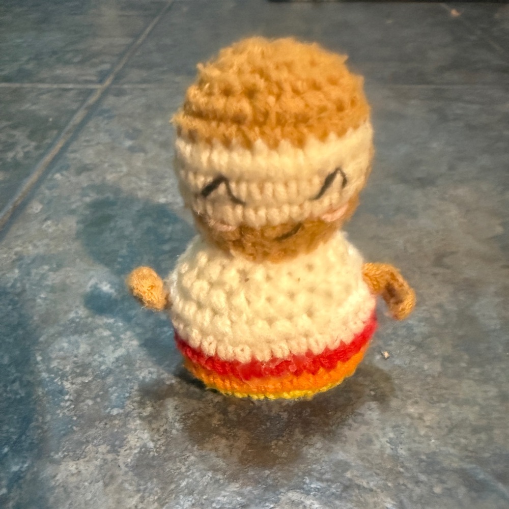 Handmade Crochet Doll with Red and Yellow Accents